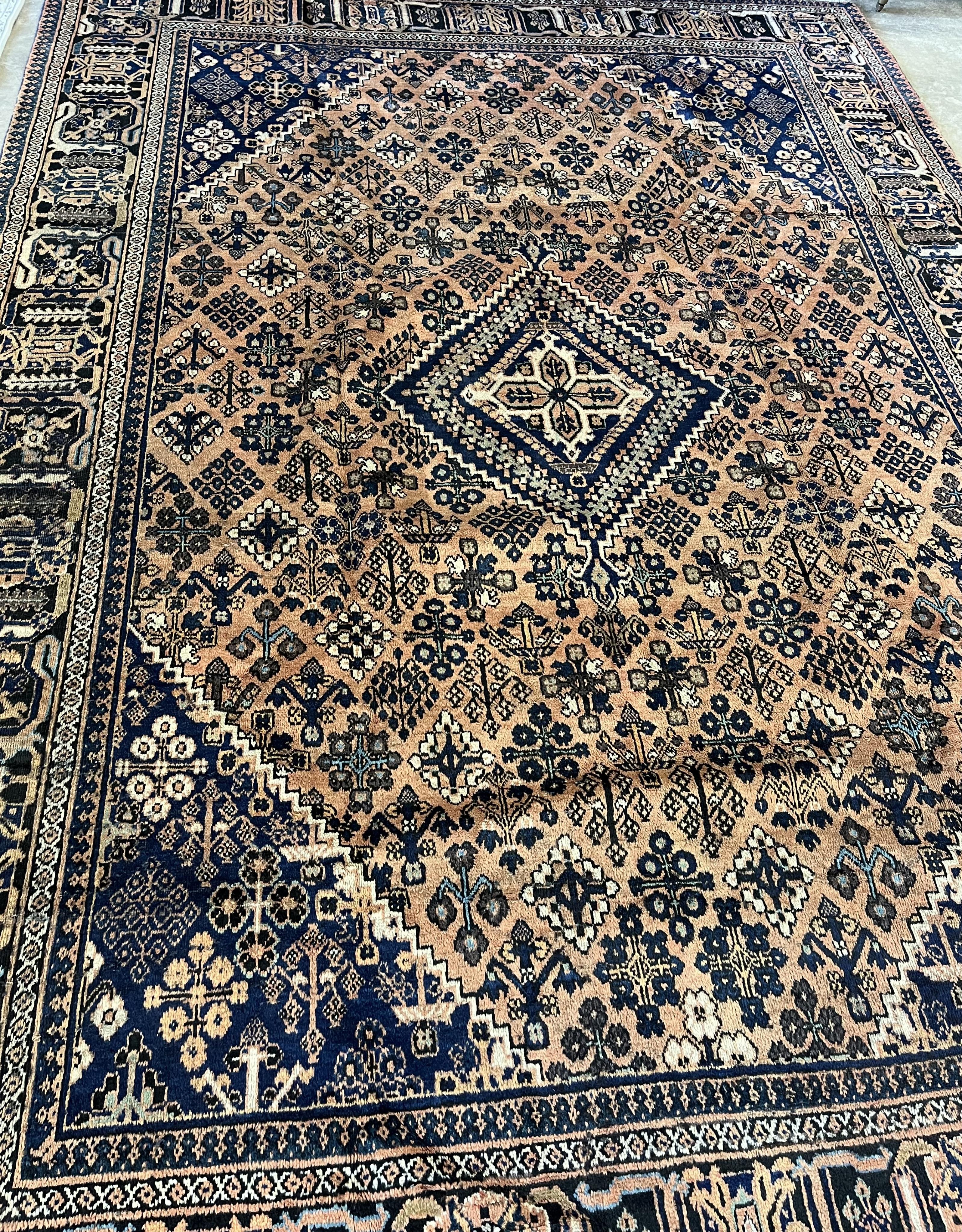A Joshagan peach ground carpet, 342 x 250. Condition - good